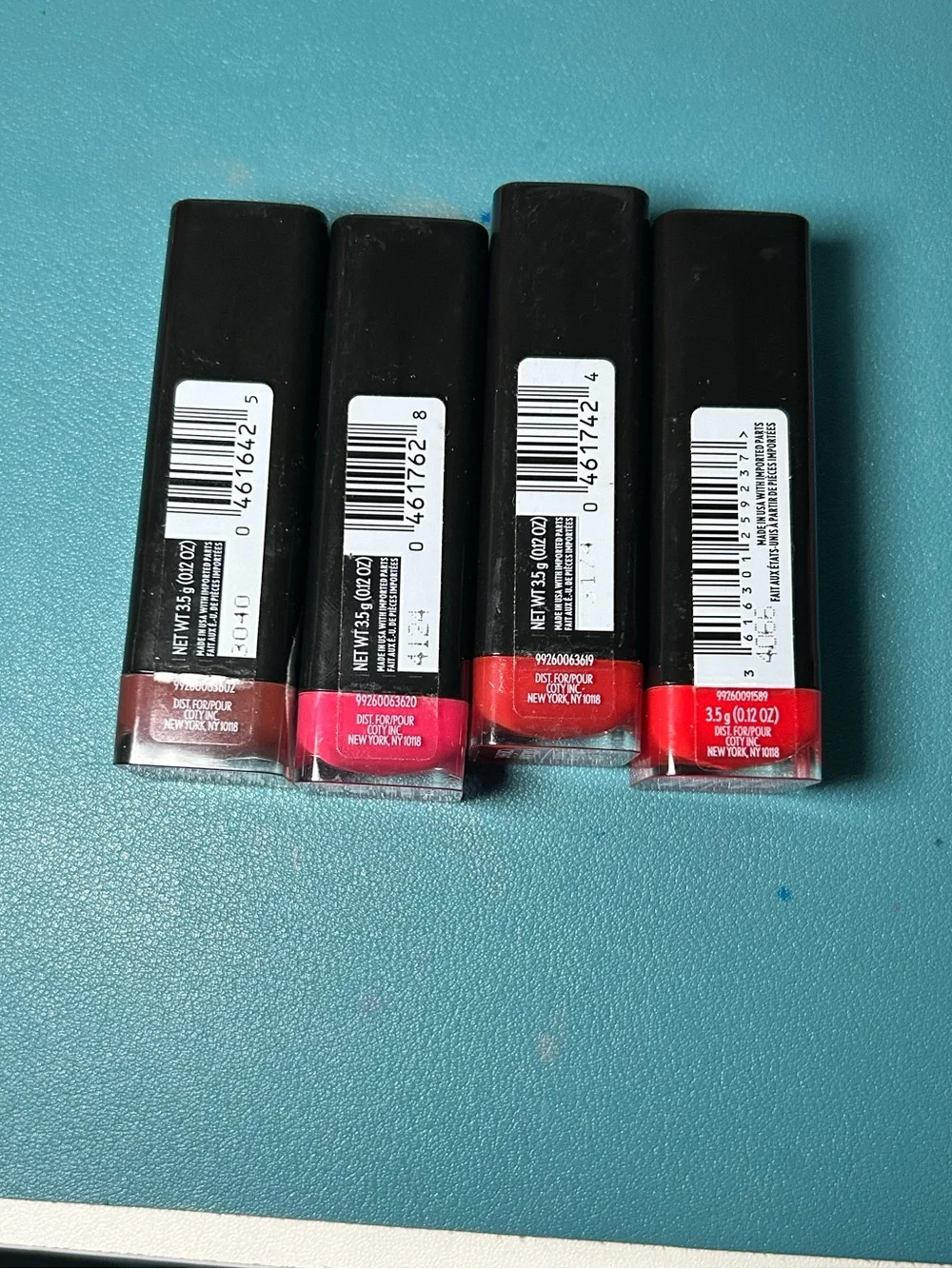 COVERGIRL Exhibitionist Crème Lipstick Set 4pc- Brown, Hot Pink, Red, Bright Red